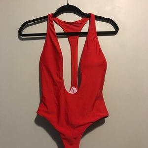 Red plunge one piece